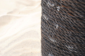 Coarse rope made of natural fiber material - sisal plant. Macro photo of texture, background