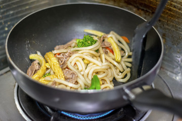 Pan Frying Japanese Udon Noodles on a Gas Stove.