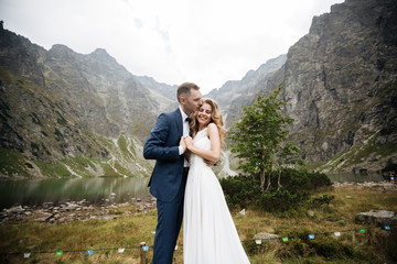 wedding day. brides kiss in love