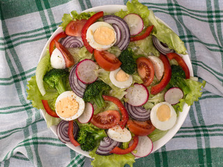 delicious fresh salad of vegetables and herbs.