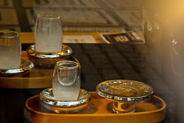 Prague, Czech Republic. 10.05.2019: Bohemian glass offered by a souvenir shop on Old Town Square. Precious items, expensive dishes. Crystal.