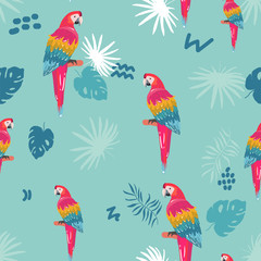 Naklejka premium Seamless pattern with palm trees leaves and Blue Yellow and Red Blue Macaw parrots. Textile Wrapping paper background. repeating image. hand drawing