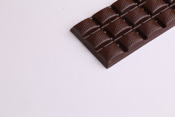 milk chocolate tablet in color background