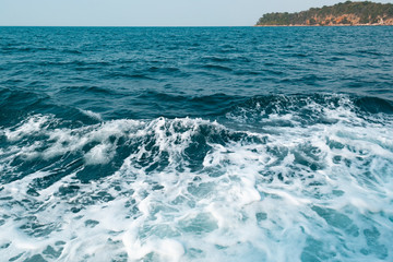 Fototapeta na wymiar Blue ocean waves and islands