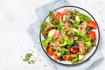 Tafelkleed Salmon salad on white top view. © nadianb