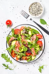 Abwaschbare Fototapete Salmon salad on white top view. © nadianb