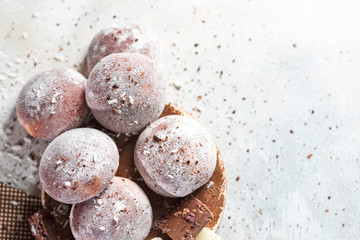 Chocolate coconut Japanese ice cream Mochi in rice dough. Traditional Japanese dessert on white background.