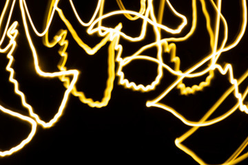 White, gold and yellow color magic light lines. Abstract pattern for light overlays background. Art tool texture based on particles, night party or shutter bulb motion effect in speed.