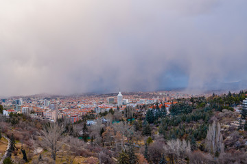 Ankara/Turkey-February 08 2020-Ankara view with Sheraton Hotel and botanical garden in stormy day.