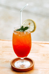 Iced lemon tea in a beautiful shape glass, ready to drink