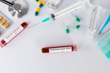 Blood test tube with the Coronavirus disease for virus test and research