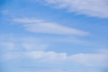 Low Angle View Of Clouds In Blue Sky.