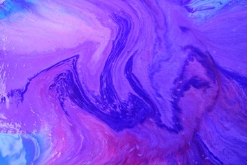 Purple-lilac abstract background. Natural stone texture. Acrylic paint flows freely and creates an...