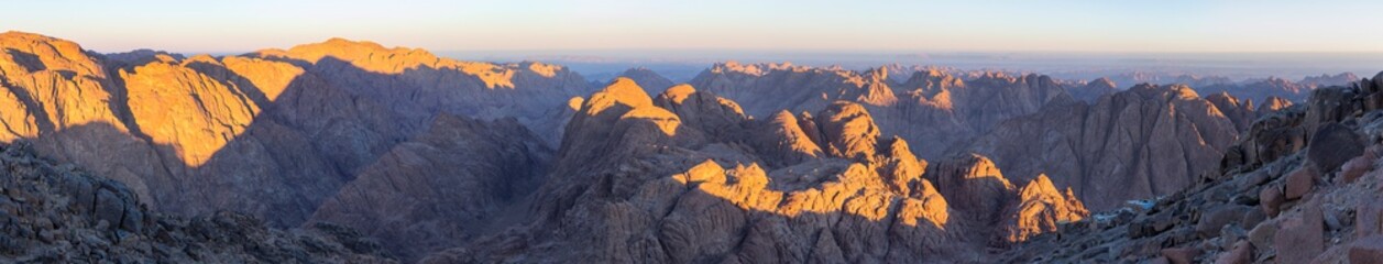 Naklejka premium Egypt. Mount Sinai in the morning at sunrise. Bedouin village. (Mount Horeb, Gabal Musa, Moses Mount). Pilgrimage place and famous touristic destination.