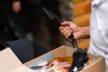 Shuriken throwing star, traditional japanese ninja cold weapon stuck in surprise box for man...