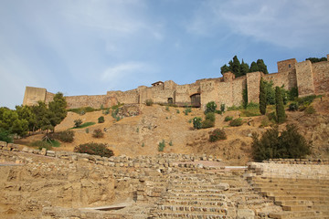 Castle of Gibralfaro with the roman theatre in the foreground, Malaga, Andalusia, Southern Spain.