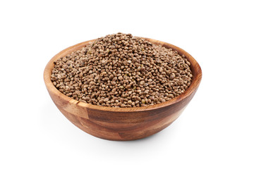 Hemp seeds in wooden bowl, isolated.