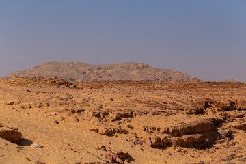 Fototapeta na wymiar Egypt. Desert and mountains of the Sinai Peninsula. Sands, dunes, rocks and gorges. Promised land.