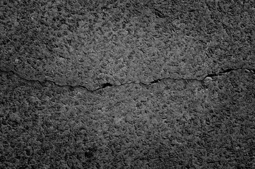 Concrete surface with relief and cracks