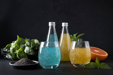 Basil seed drink in glass on black background. Close up.