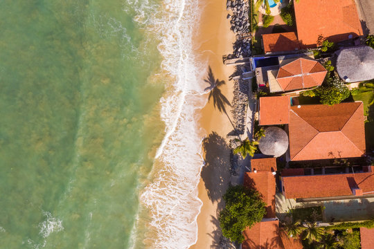 Aerial view of houses on the shore of the beach, Taiba, S&bdquo;o Gon&Aacute;alo do Amarante, Cear&middot;, Brazil