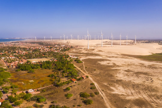 Aerial view of the beach shore with windmills in the background, Taiba, S&bdquo;o Gon&Aacute;alo do Amarante, Cear&middot;, Brazil