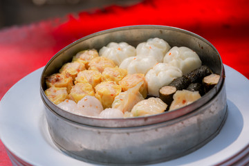 Dim sum in bamboo steamer, chinese cuisine. Dim sum in steam chinese cuisine hong kong. yumcha,The Arrangment of various dim sum in bamboo steamer with chinese bun