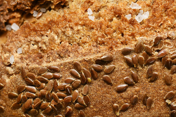 Fototapeta na wymiar background of bread, seeds and salt
