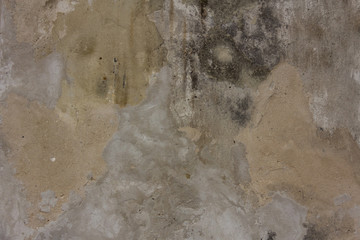 Gray concrete in dirty drips. The wall of the old building. Horizontal photo