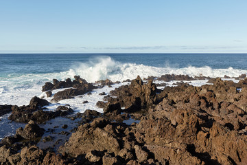 Fototapeta na wymiar View of the ocean waves on the coast of the Canary island.