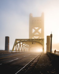 Foggy Tower Bridge Sacramento and a cyclist
