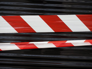 red and white barrier tape