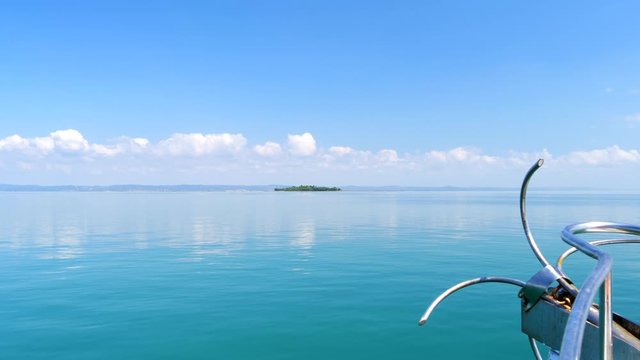 Boat approaching Ilha do Medo, The Island of Fear at Baia de todos os santos, Bahia, Brazil