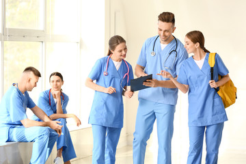 Group of medical students in hall of clinic