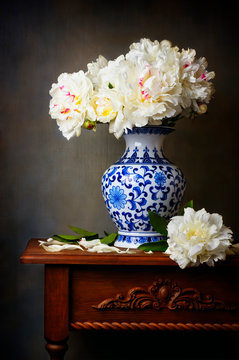 Still life with white peonies in a chinese vase