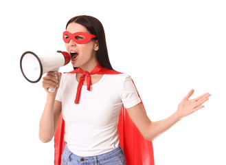 Screaming woman in superhero costume and with megaphone on white background. Concept of feminism
