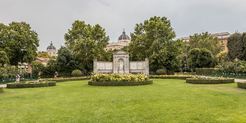 Fototapeta na wymiar Vienna, Austria - September 1, 2019: Monument for the poet Franz Grillparzer in Volksgarten (People's Garden) in Vienna, Austria