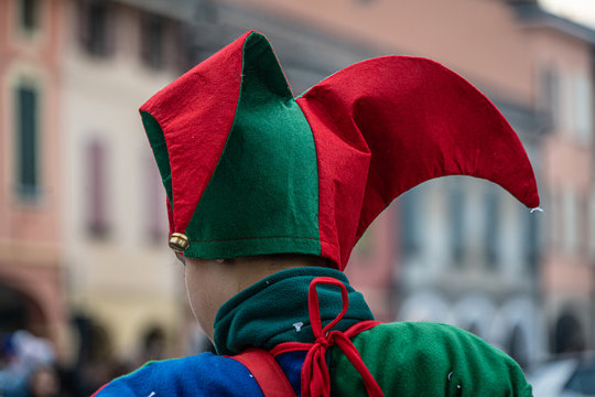 green and red joker hat