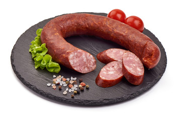 Smoked pork sausage ring, isolated on white background