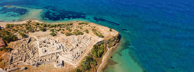 Aerial drone ultra wide top down photo of archaeological site of Temple of Apollo in island of Aegina, Greece © aerial-drone