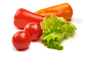 Sweet peppers with lettuce, isolated on white background