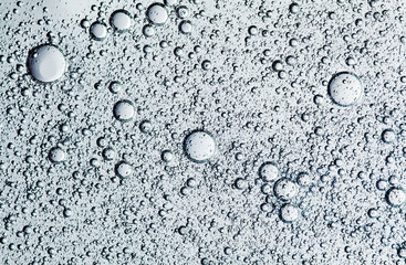 many air bubbles in the water macro