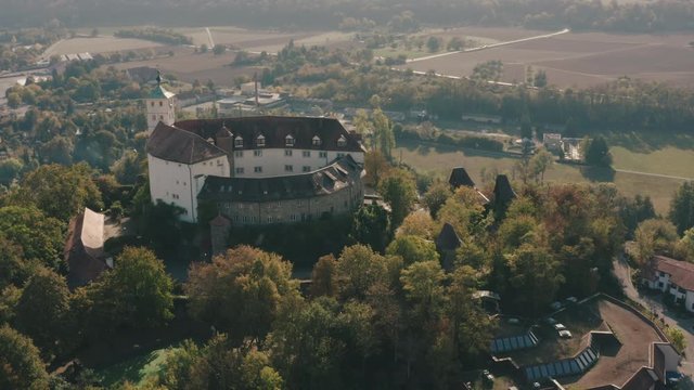 Aerial view historic castle surrounded by river and town at beautiful sunset Vaihingen Germany in 4k