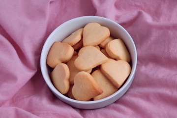 Сookies for valentines day. heart on a pink background