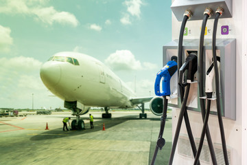 electric aircraft charger station with plug and power cable supply on cargo or airplane parking with blue sky background