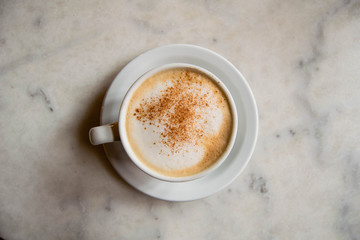 cup of coffee on marble table