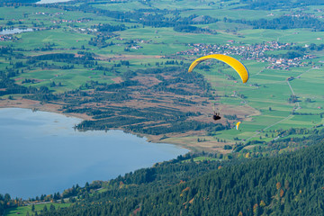 Paragliding in over lakes in Bavarian Alps