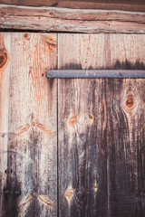 Old wooden barn door. Texture of old board.