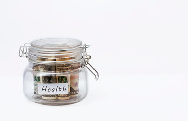 Closed transparent jar with banknotes