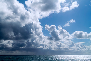 Fototapeta premium Dramatic sky above glittering sea
